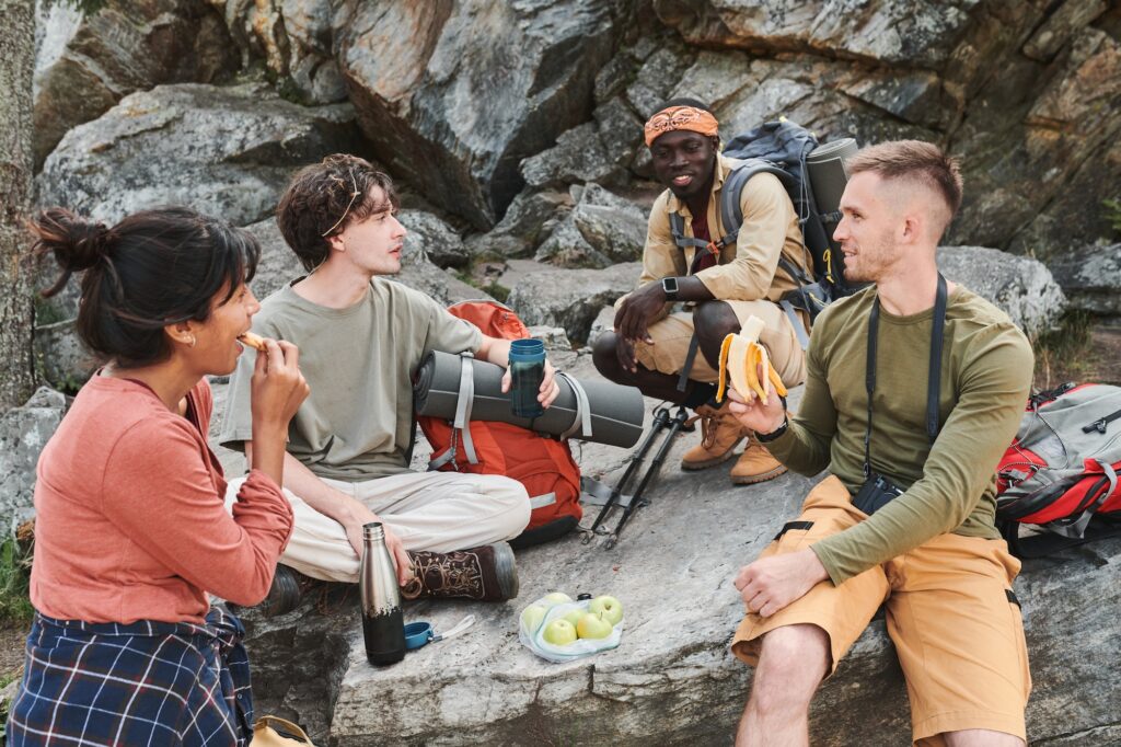 Hikers eating fruits